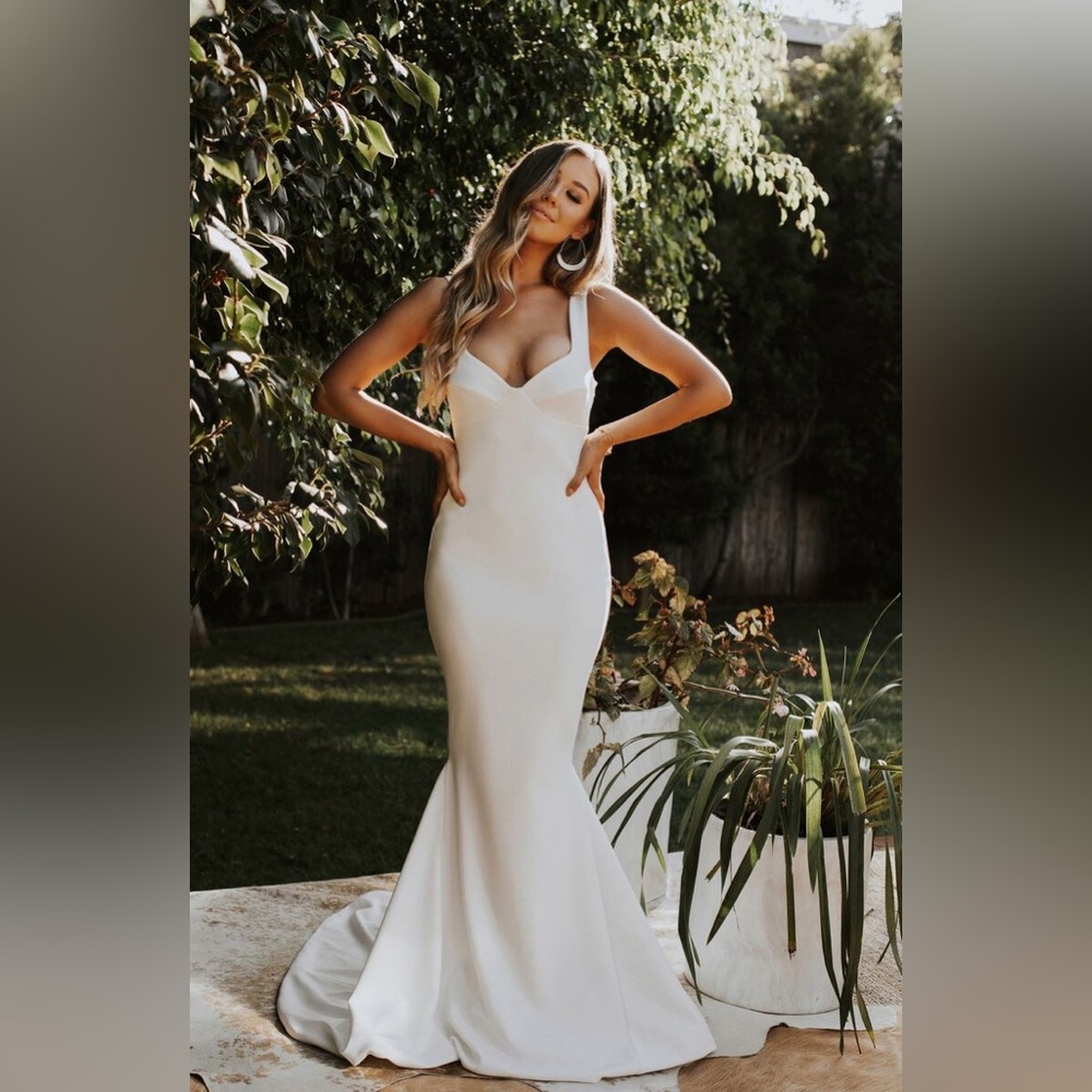 Beautiful wedding dress. Bought and never wore